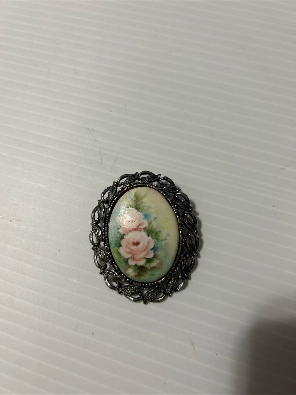 Pink Rose Oval Brooch with Silver-Tone Filigree Frame